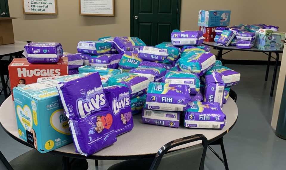 Employees Donate to Catholic Charities Diaper Drive